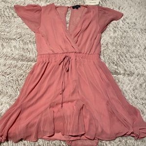 Francesca’s mauve wrap dress